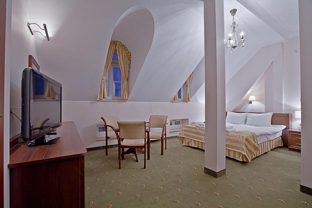 Posteľ alebo postele v izbe v ubytovaní Hotel Masovia