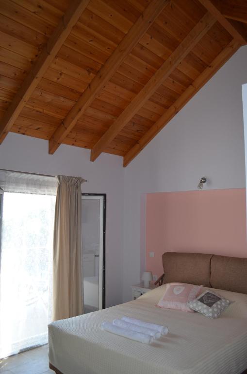Postel nebo postele na pokoji v ubytování Romanza Studios