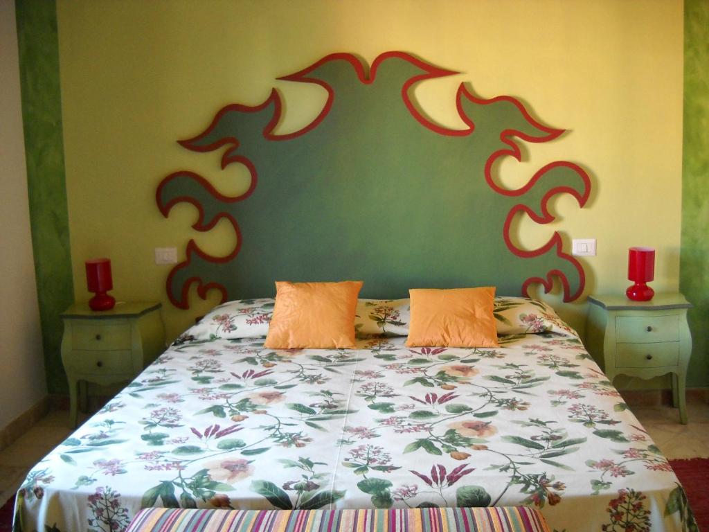 Postel nebo postele na pokoji v ubytování Hotel Baglio Catalano