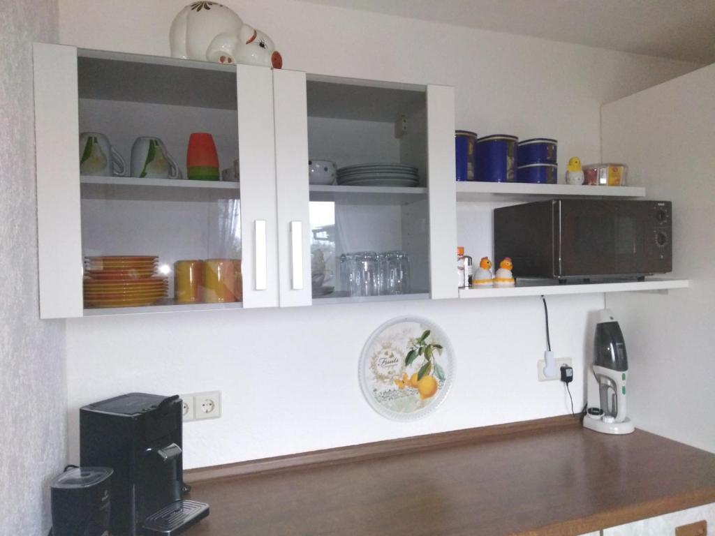 Kuchyň nebo kuchyňský kout v ubytování Ferienwohnung Kiruga