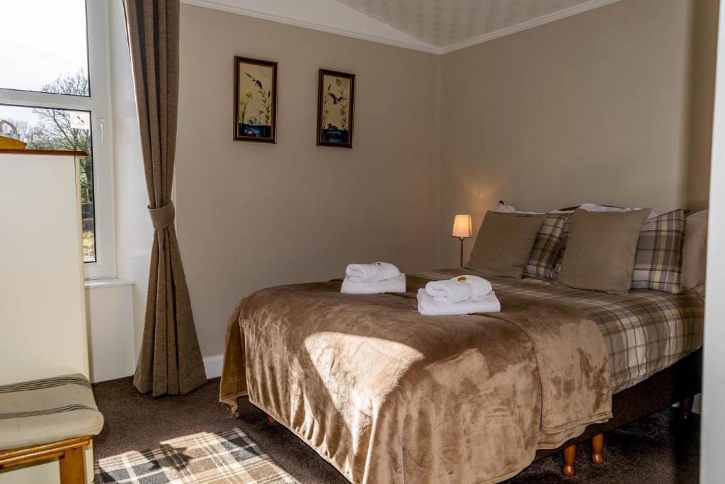 Postel nebo postele na pokoji v ubytování The Tregortha B&B
