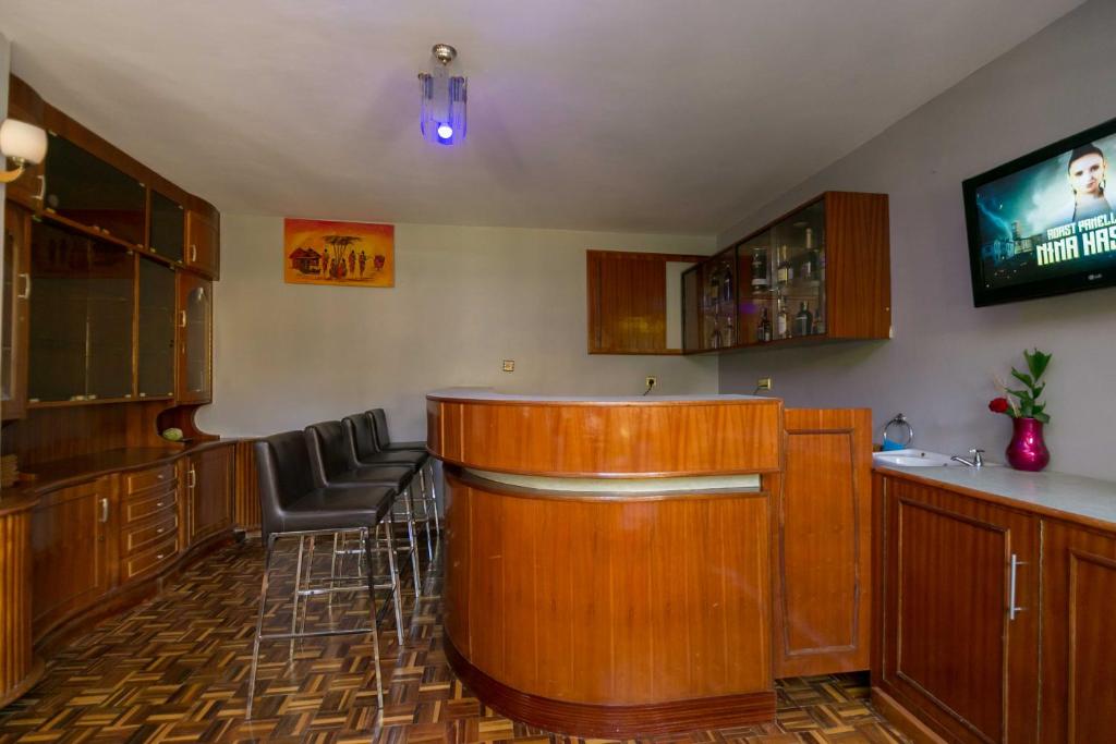 Kuchyň nebo kuchyňský kout v ubytování Fahari Gardens Hotel