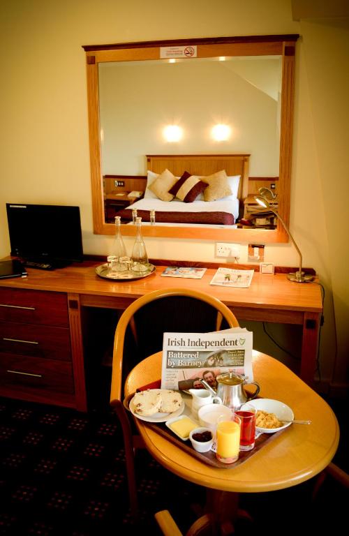 Postel nebo postele na pokoji v ubytování Bush Hotel