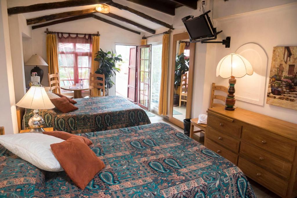 Postel nebo postele na pokoji v ubytování Boutique Hotel Antinea