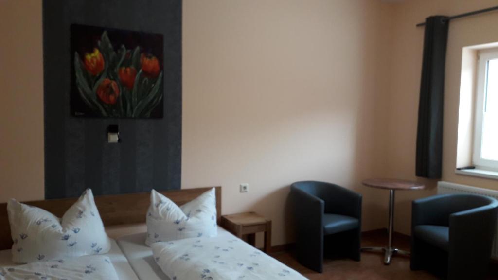 Postel nebo postele na pokoji v ubytování Hotel Wittenberg-Hotel Garni