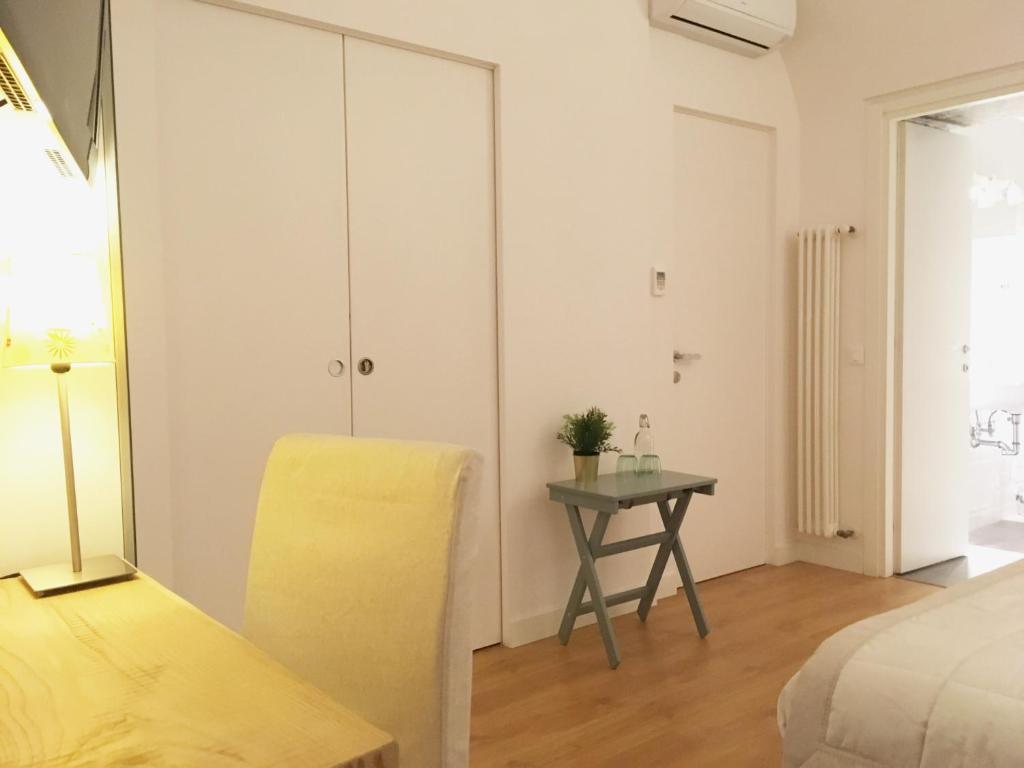 Posteľ alebo postele v izbe v ubytovaní M SuiteApartment Roma