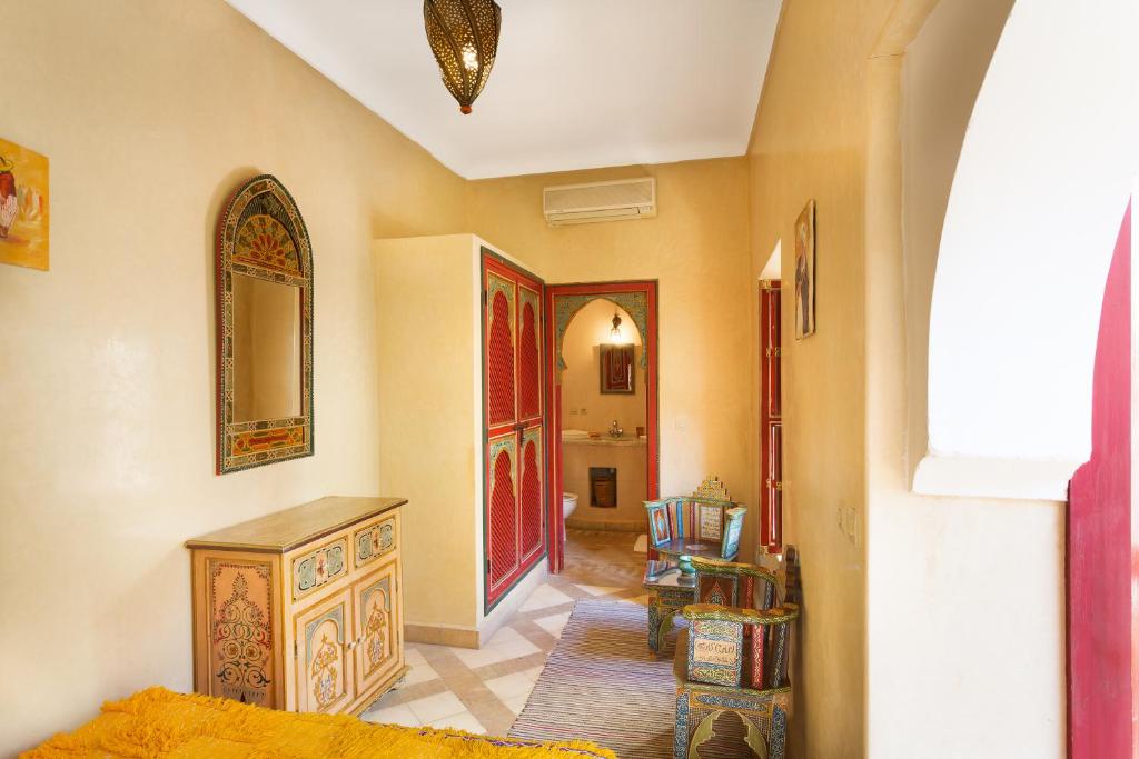 Uma cama ou camas num quarto em Riad Julia