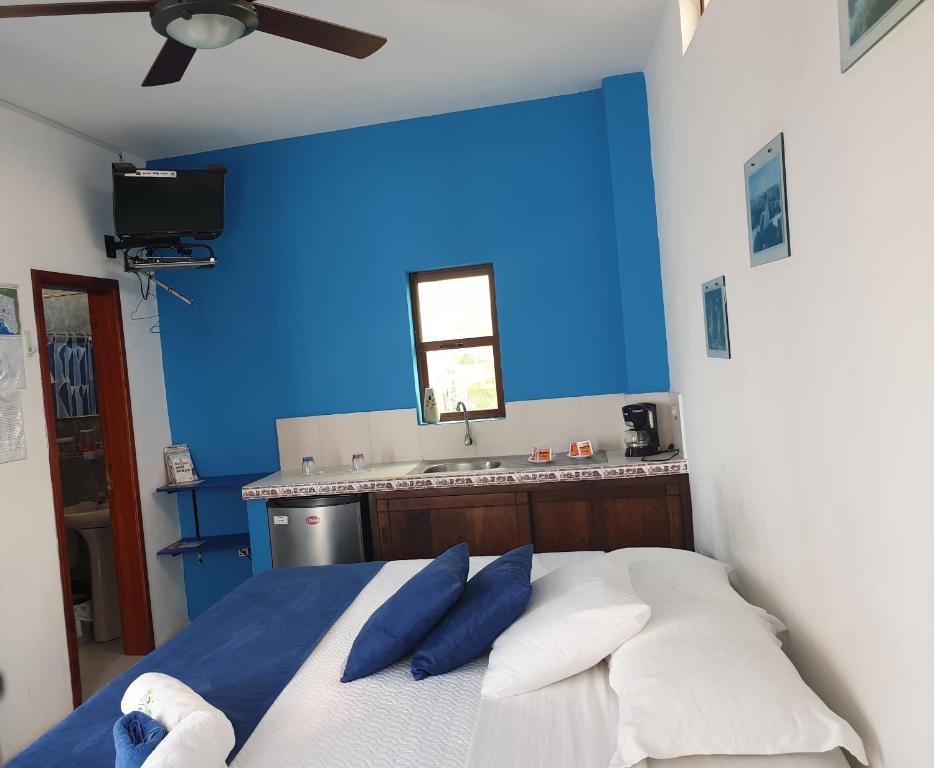Postel nebo postele na pokoji v ubytování Sun Island