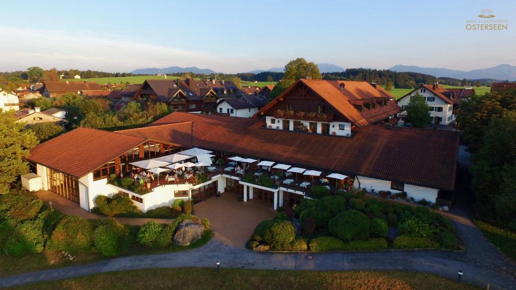 an aerial view of a house with a roof at Landgasthof Osterseen in Iffeldorf