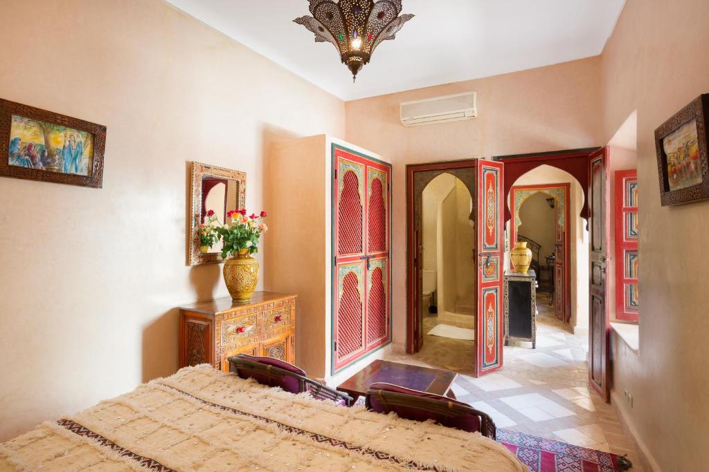 Uma cama ou camas num quarto em Riad Julia