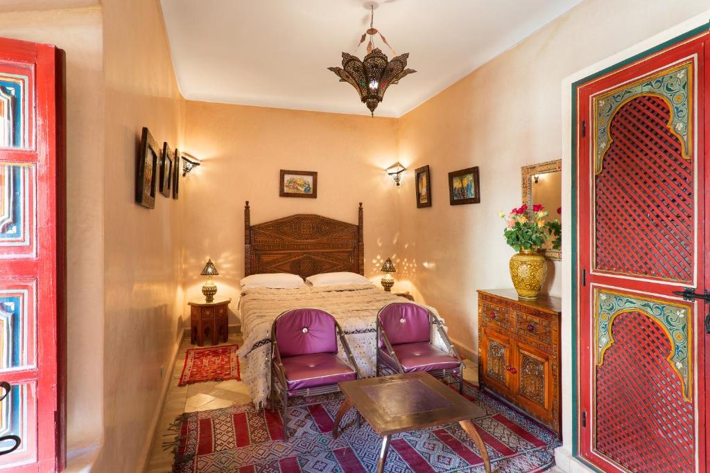 Uma cama ou camas num quarto em Riad Julia