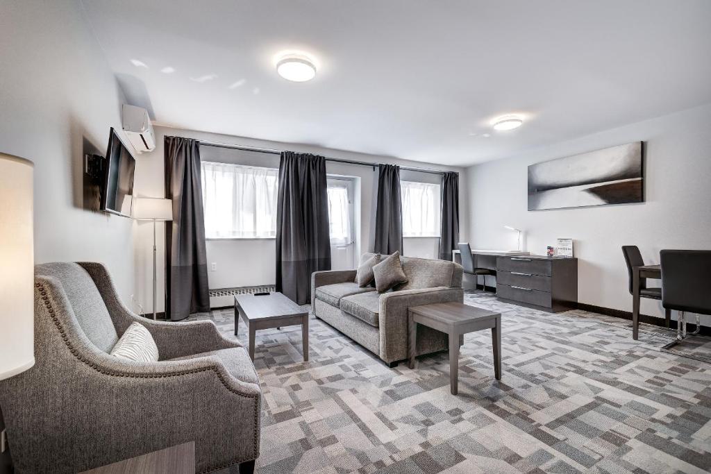 TV a/nebo společenská místnost v ubytování Terrasse Royale Hotel