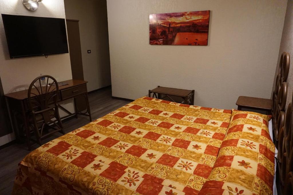 Postel nebo postele na pokoji v ubytování Hotel Plaza Crystal