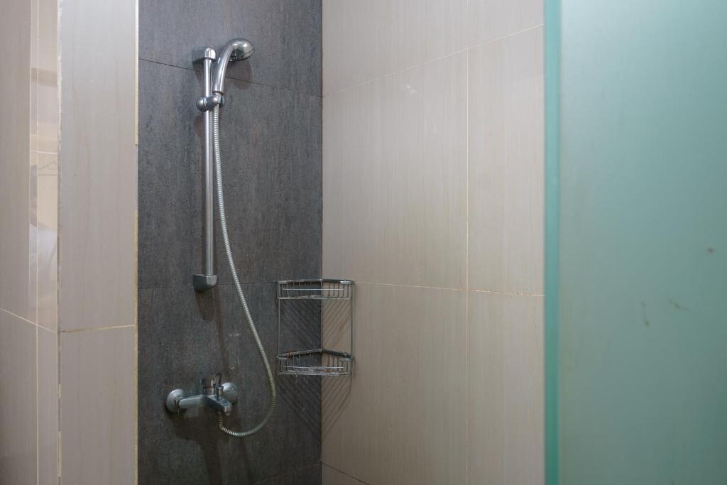 Koupelna v ubytování RedDoorz Plus at Hotel Negeri Baru Lodaya Puncak