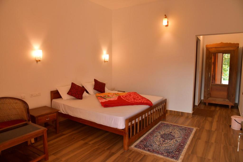 Postel nebo postele na pokoji v ubytování Wild Mist Homestay