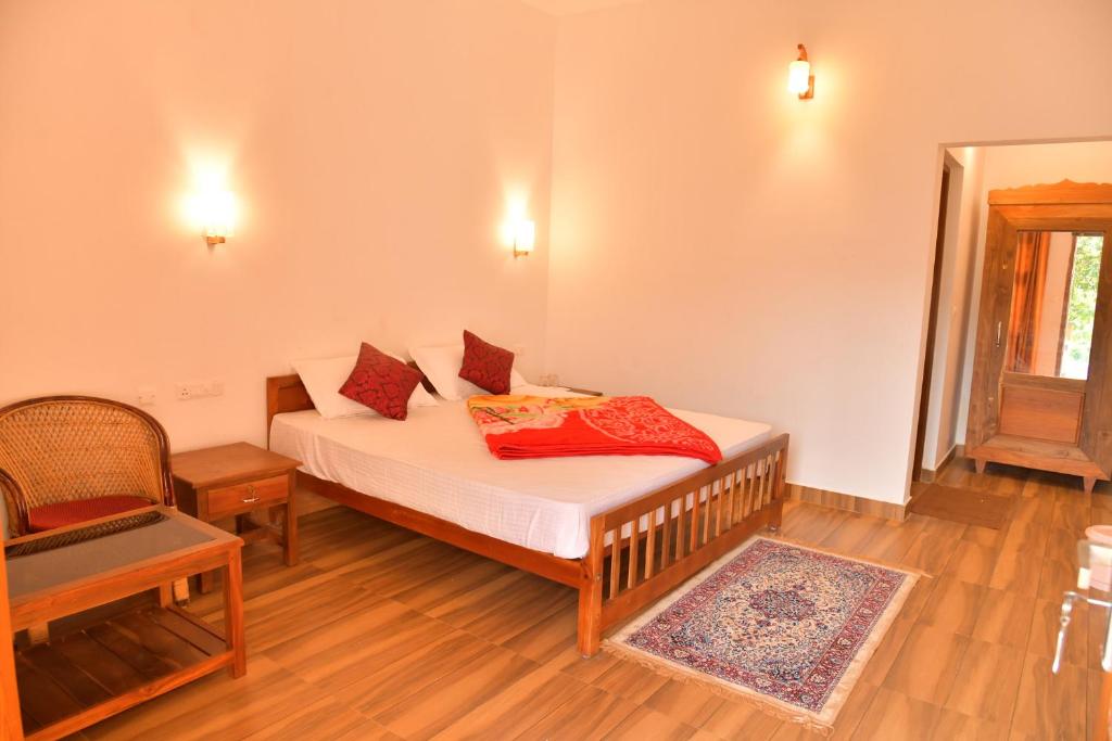 Postel nebo postele na pokoji v ubytování Wild Mist Homestay