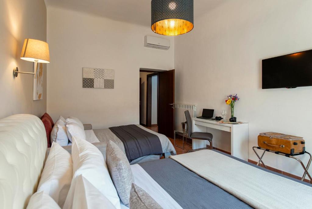 A television and/or entertainment centre at Veneto Prestige Apartment