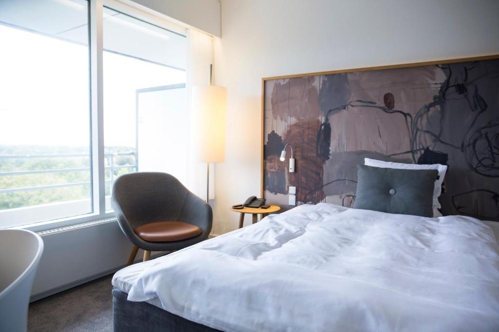 Cama o camas de una habitación en Comwell Hvide Hus Aalborg