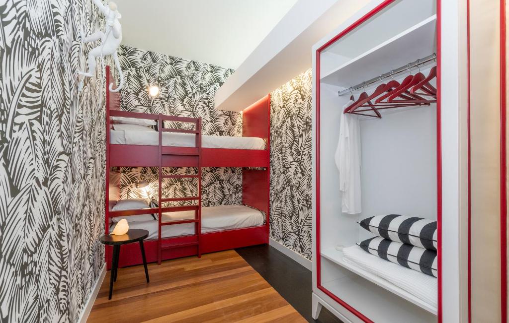 Postel nebo postele na pokoji v ubytování Cascais Casa Laranja Guesthouse