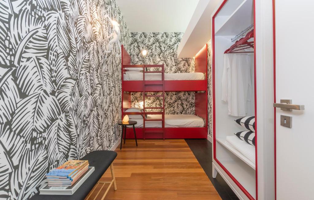 Postel nebo postele na pokoji v ubytování Cascais Casa Laranja Guesthouse