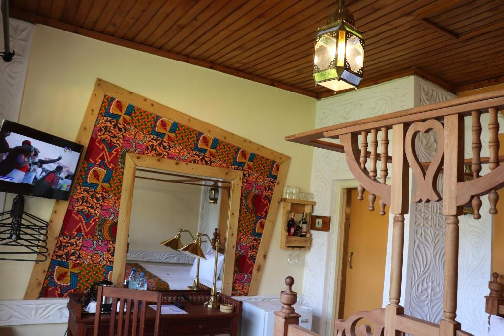 Postel nebo postele na pokoji v ubytování Parklands Shade Hotel
