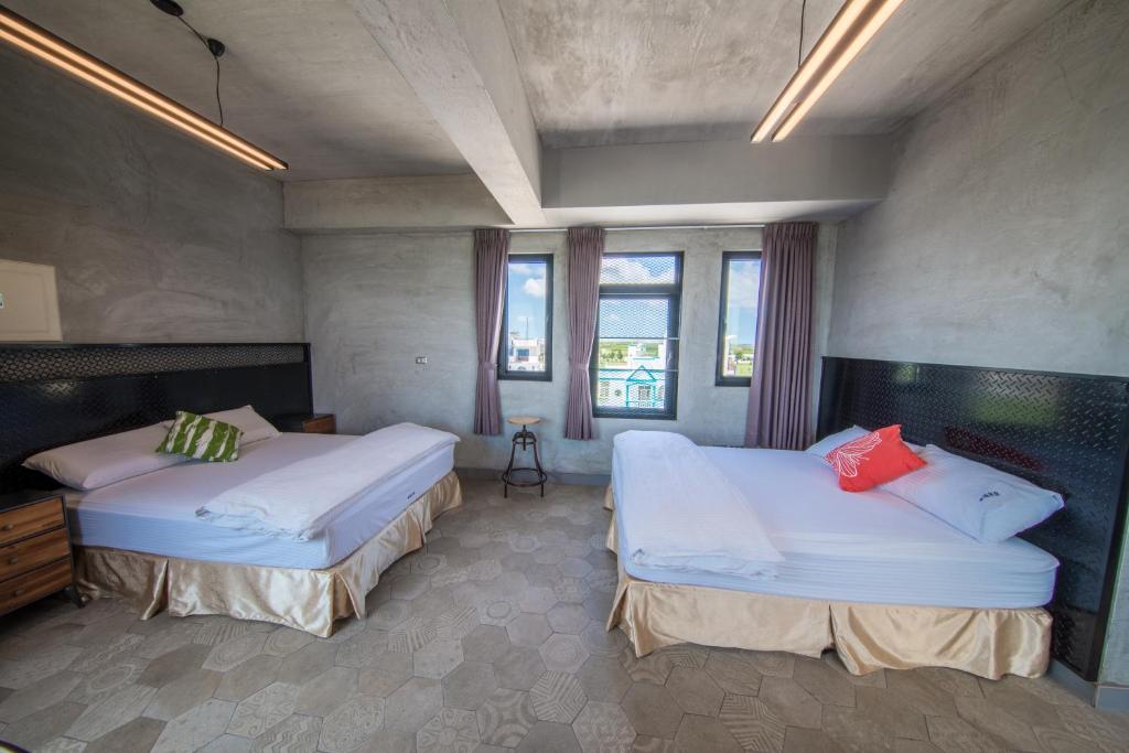 Postel nebo postele na pokoji v ubytování Mahalo B&B II