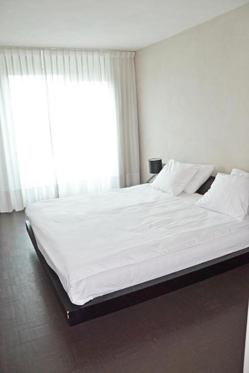 Giường trong phòng chung tại Fletcher Hotel - Restaurant Elzenduin