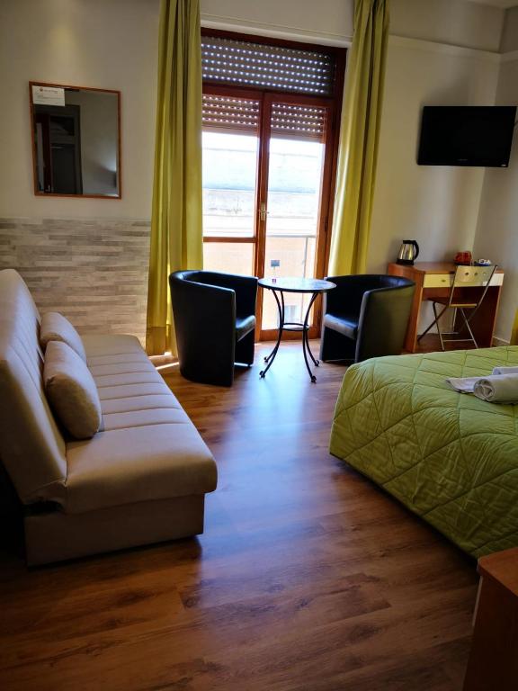 TV a/nebo společenská místnost v ubytování Sant'Oronzo B&B