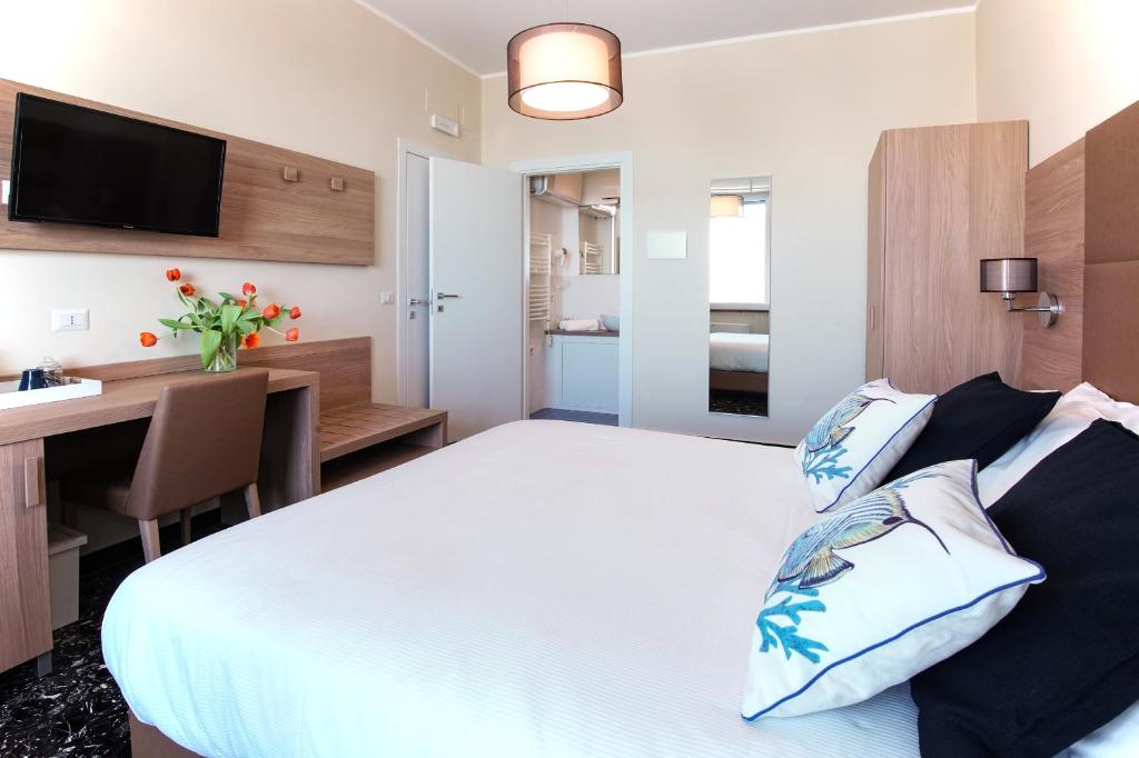 Postel nebo postele na pokoji v ubytování Bluripa Guest House