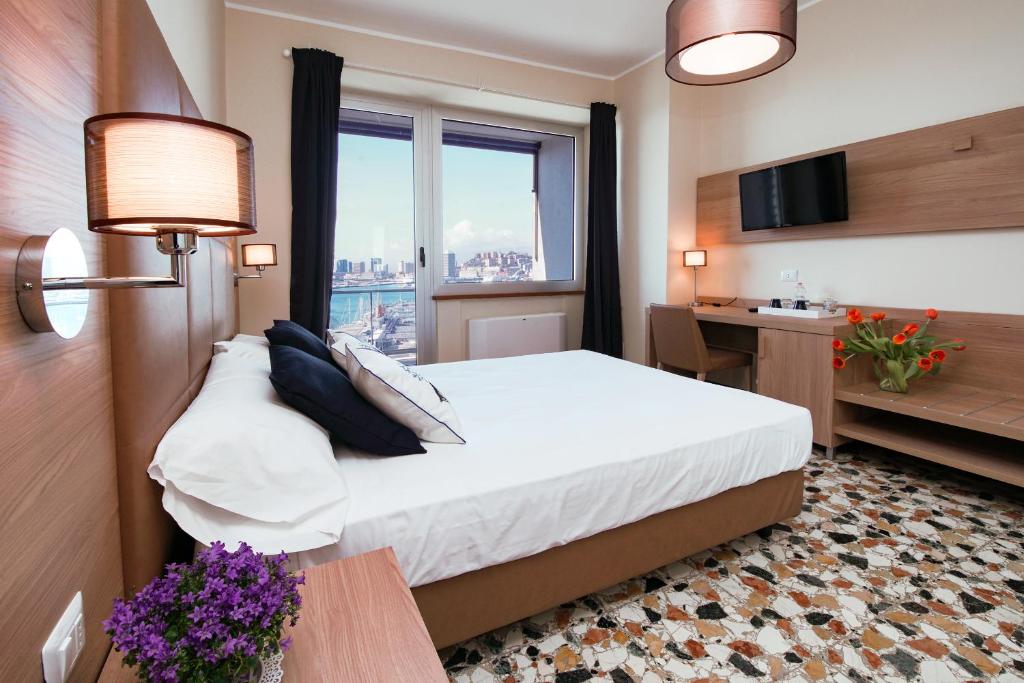 Postel nebo postele na pokoji v ubytování Bluripa Guest House