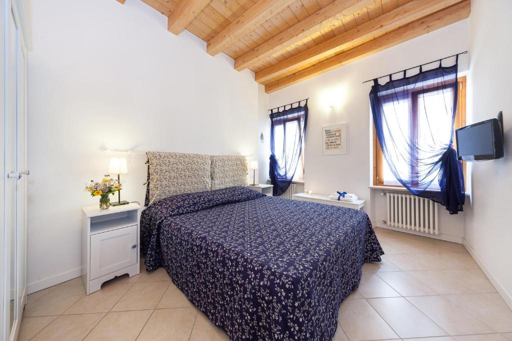 Postel nebo postele na pokoji v ubytování B&B King