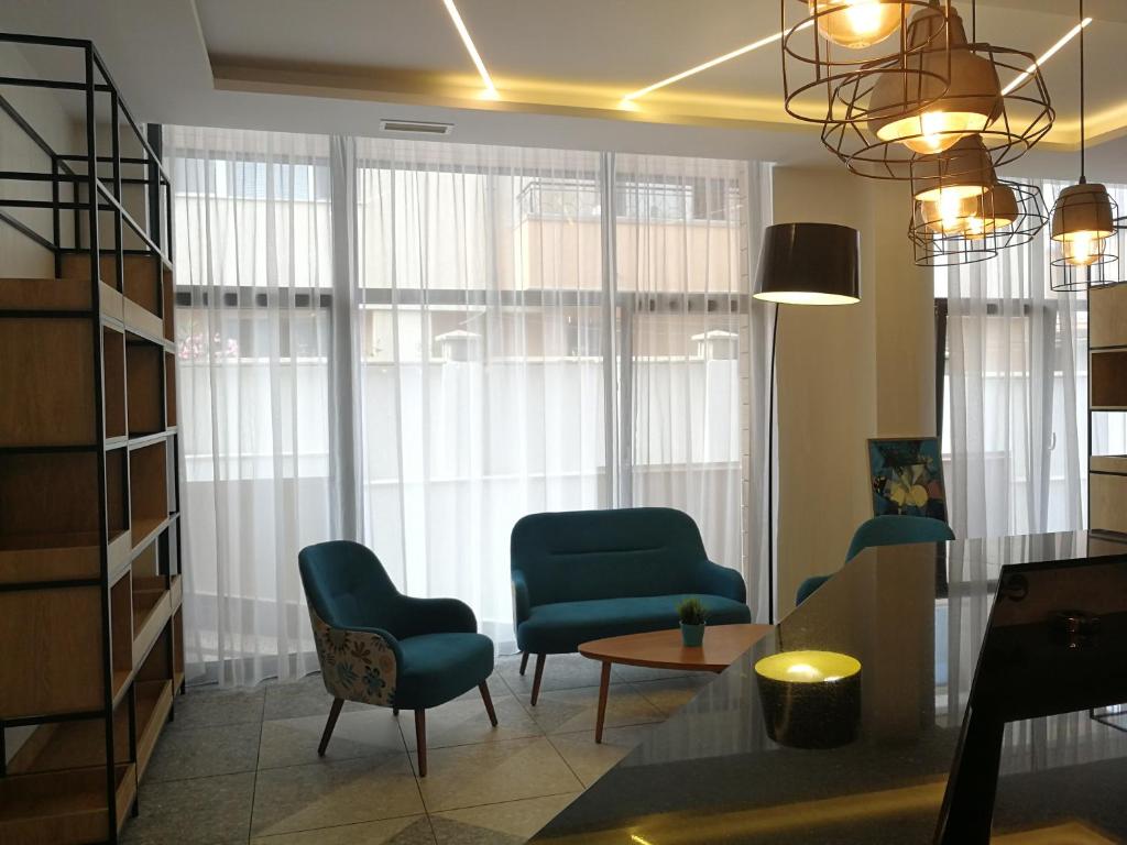 Posezení v ubytování Family Hotel LAXO