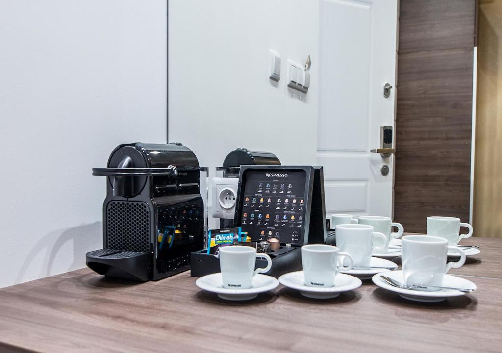 Príslušenstvo na prípravu kávy alebo čaju v ubytovaní Aparthotel Rakowicka Residence