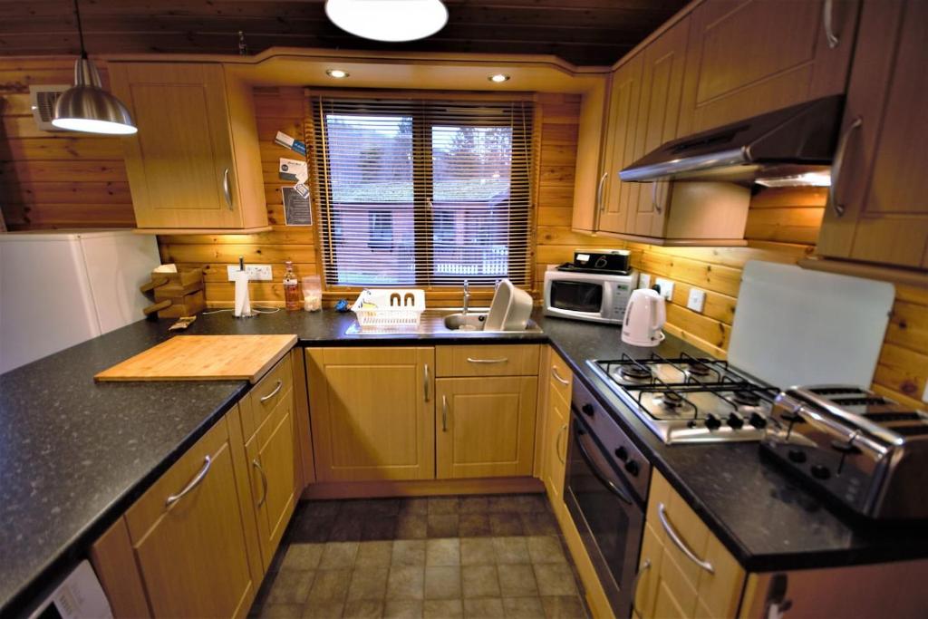 Kuchyň nebo kuchyňský kout v ubytování Ben Lomond Lodge