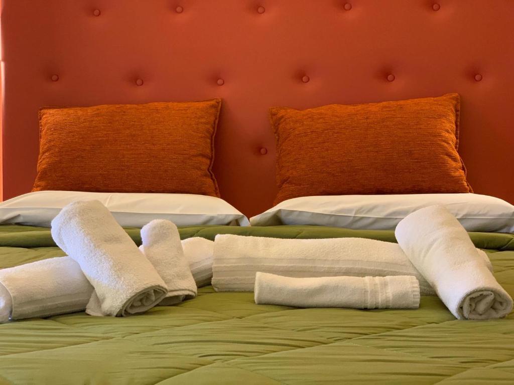 Postel nebo postele na pokoji v ubytování Sant'Oronzo B&B