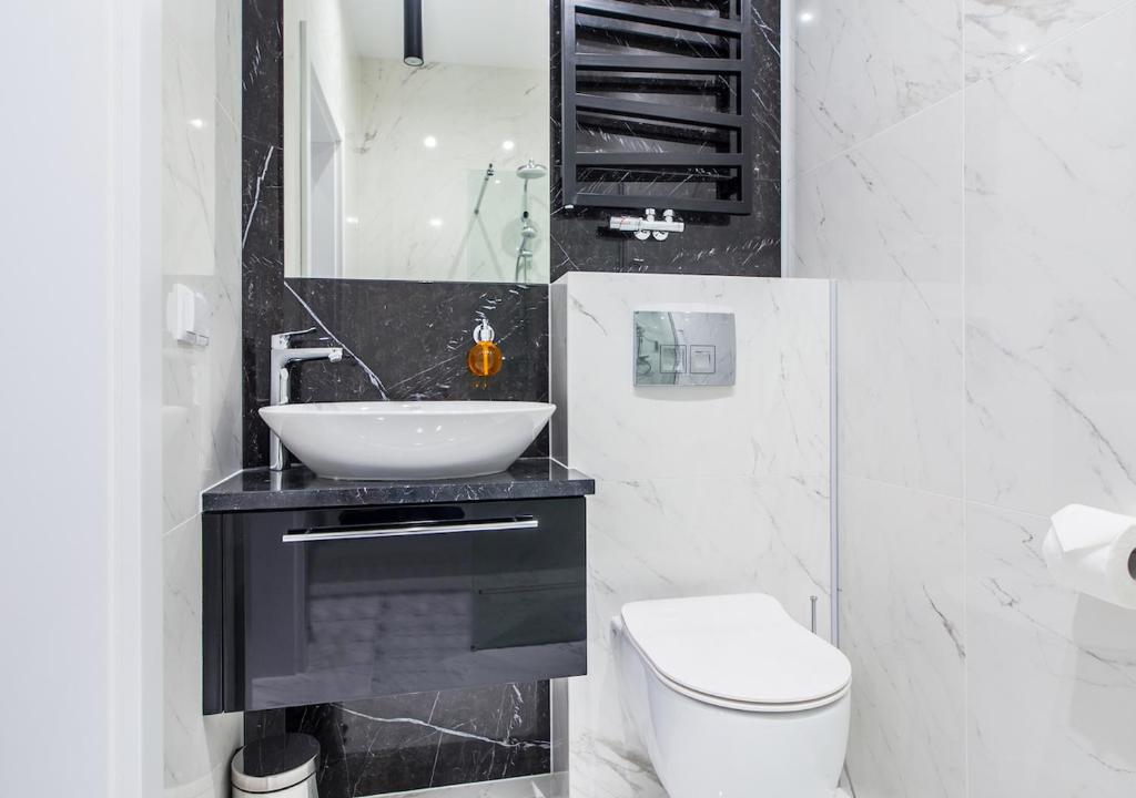 Kúpeľňa v ubytovaní Aparthotel Rakowicka Residence