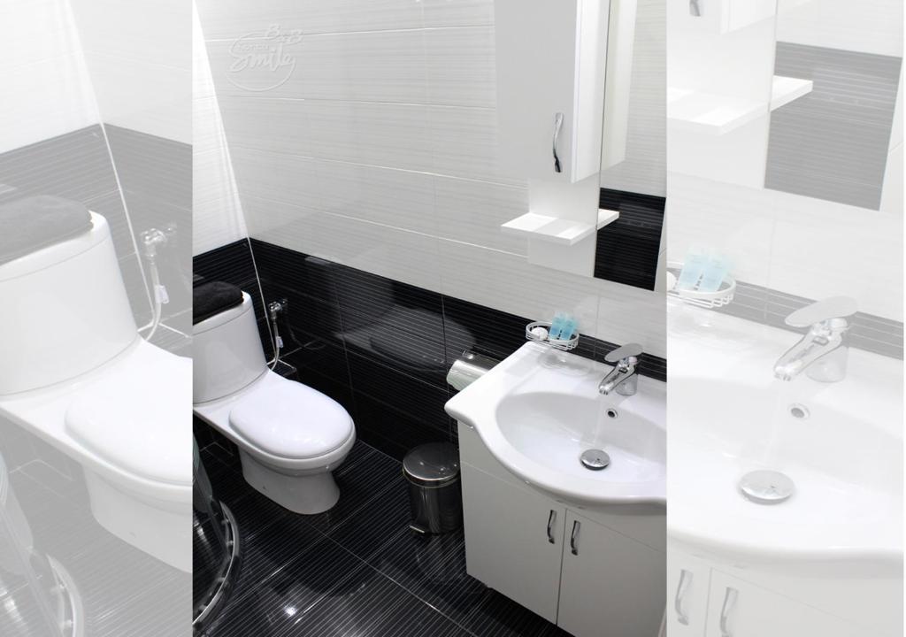 Koupelna v ubytování KorcaSmileHotel