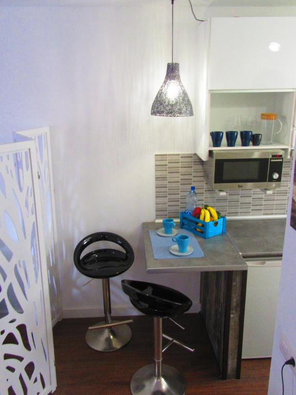 Kuchyň nebo kuchyňský kout v ubytování Estudio con encanto en la playa (aptos.salinetas)