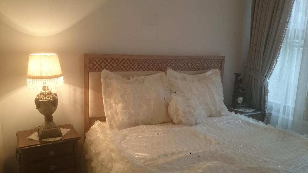 Postel nebo postele na pokoji v ubytování Fener sweet