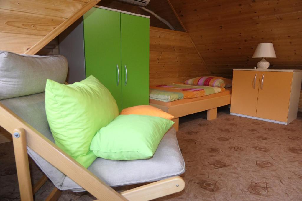 Postel nebo postele na pokoji v ubytování Apartments and rooms Brunko