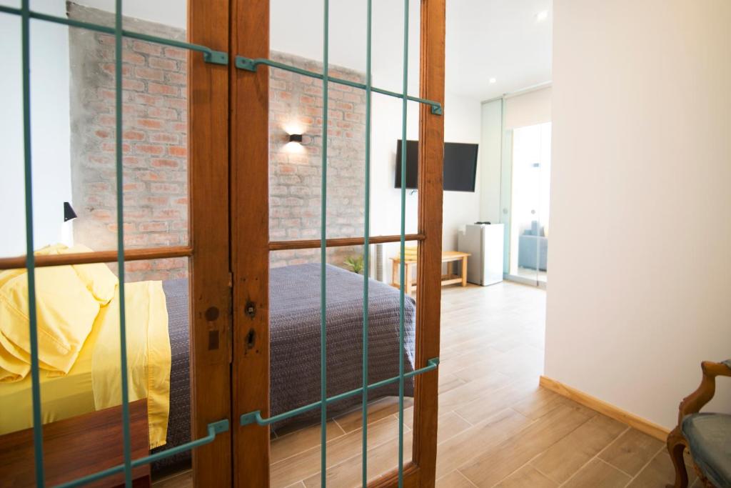 TV a/nebo společenská místnost v ubytování Kauhuhu Casa Hotel