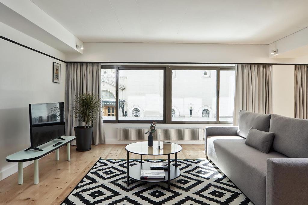 Televízia a/alebo spoločenská miestnosť v ubytovaní MONO Lofts