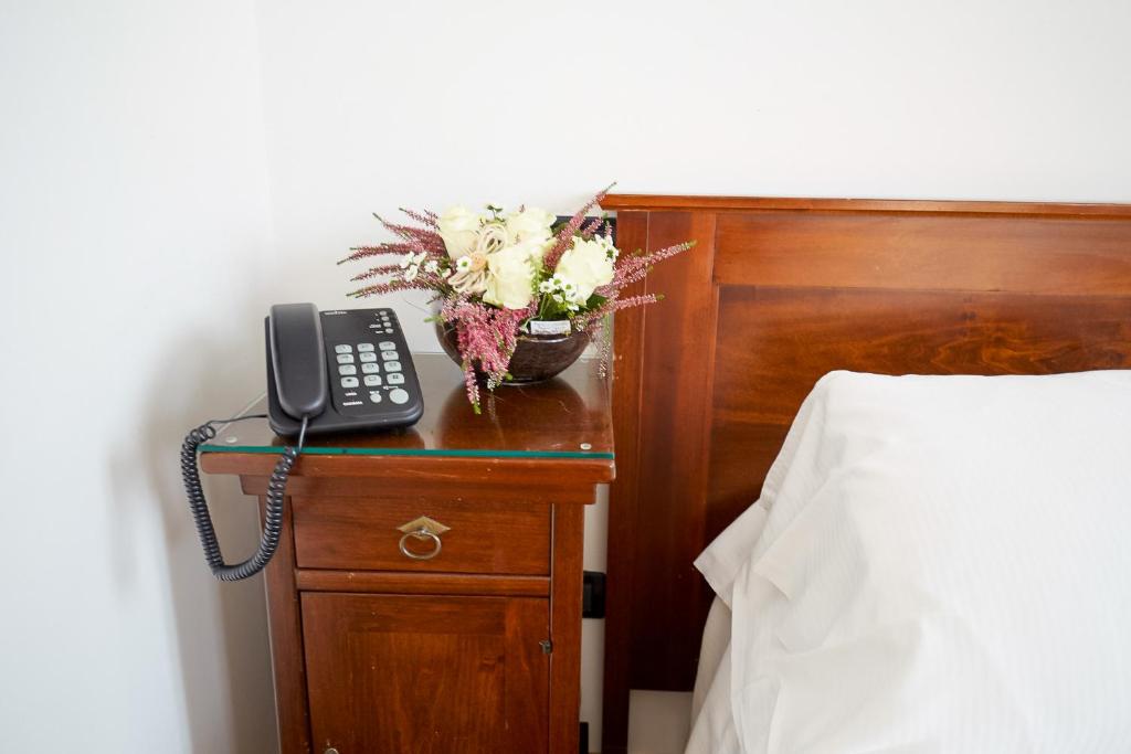 Postel nebo postele na pokoji v ubytování Hotel Riviera dei Dogi