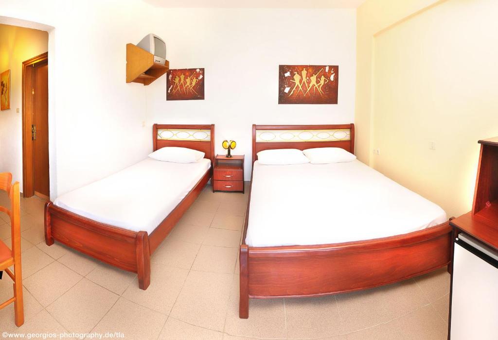 Postel nebo postele na pokoji v ubytování Hotel Stefani