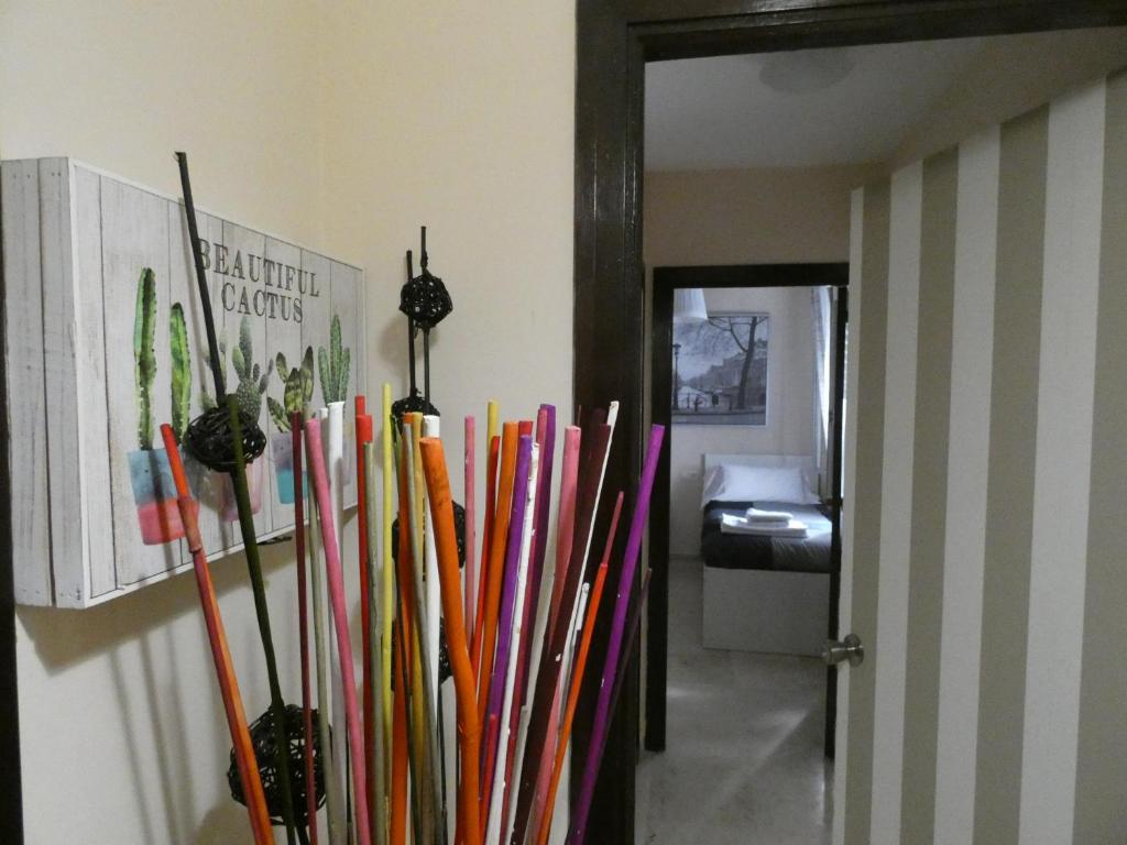 A bed or beds in a room at Plaza de San Francisco