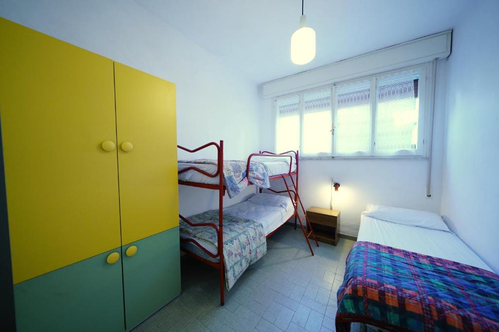 Postel nebo postele na pokoji v ubytování Villetta 2D
