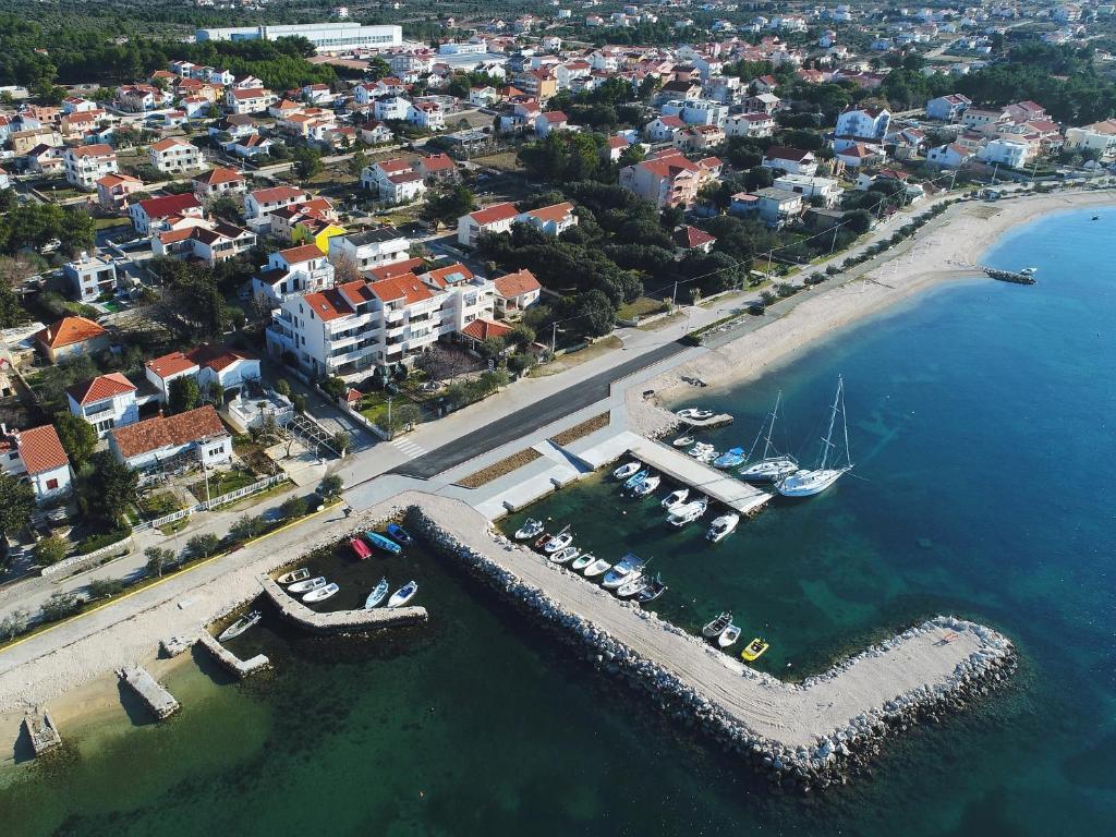 an aerial view of a harbor with boats in the water at Villa Vukic in Vrsi