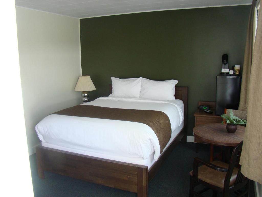 Postel nebo postele na pokoji v ubytování Paddock Inn