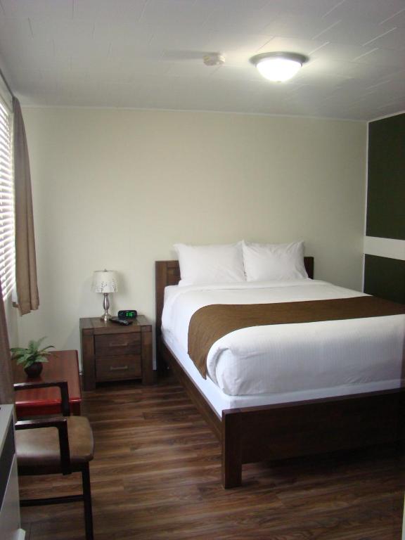 Postel nebo postele na pokoji v ubytování Paddock Inn