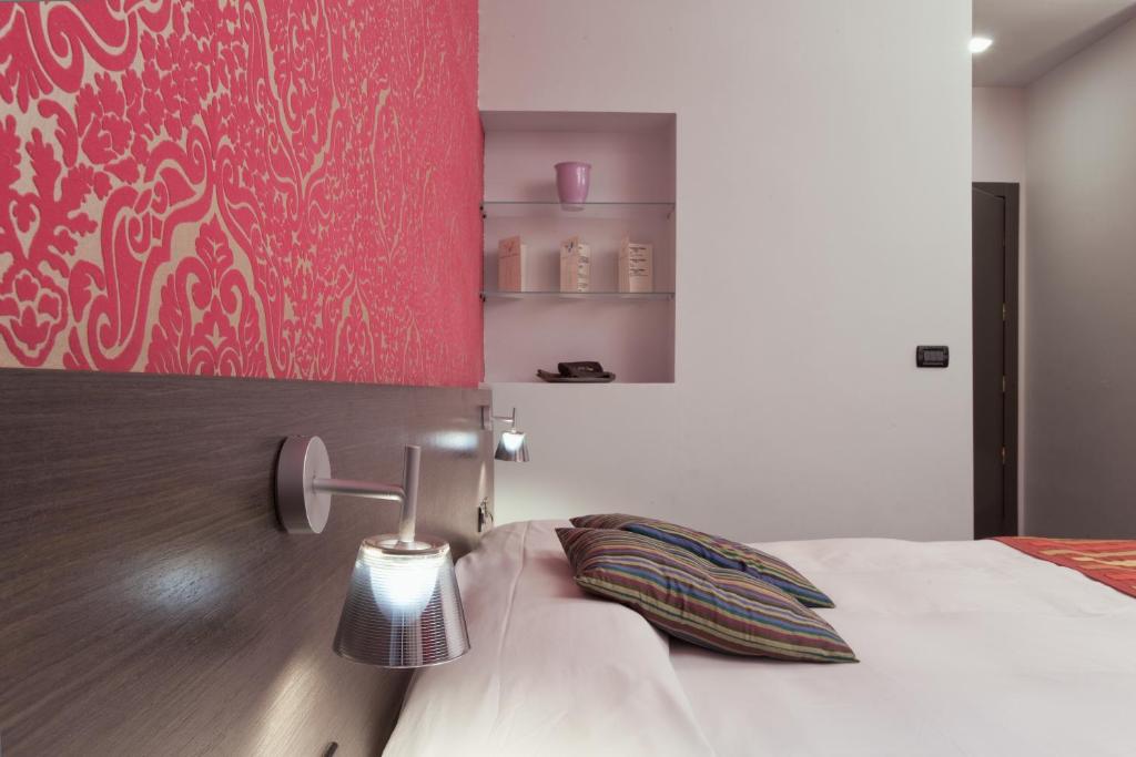 Postel nebo postele na pokoji v ubytování MA Hotel
